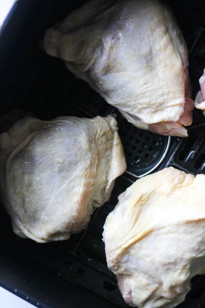 raw chicken in air fryer before cooking