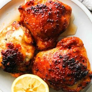 gochujang chicken thighs cooked in air fryer with lemon