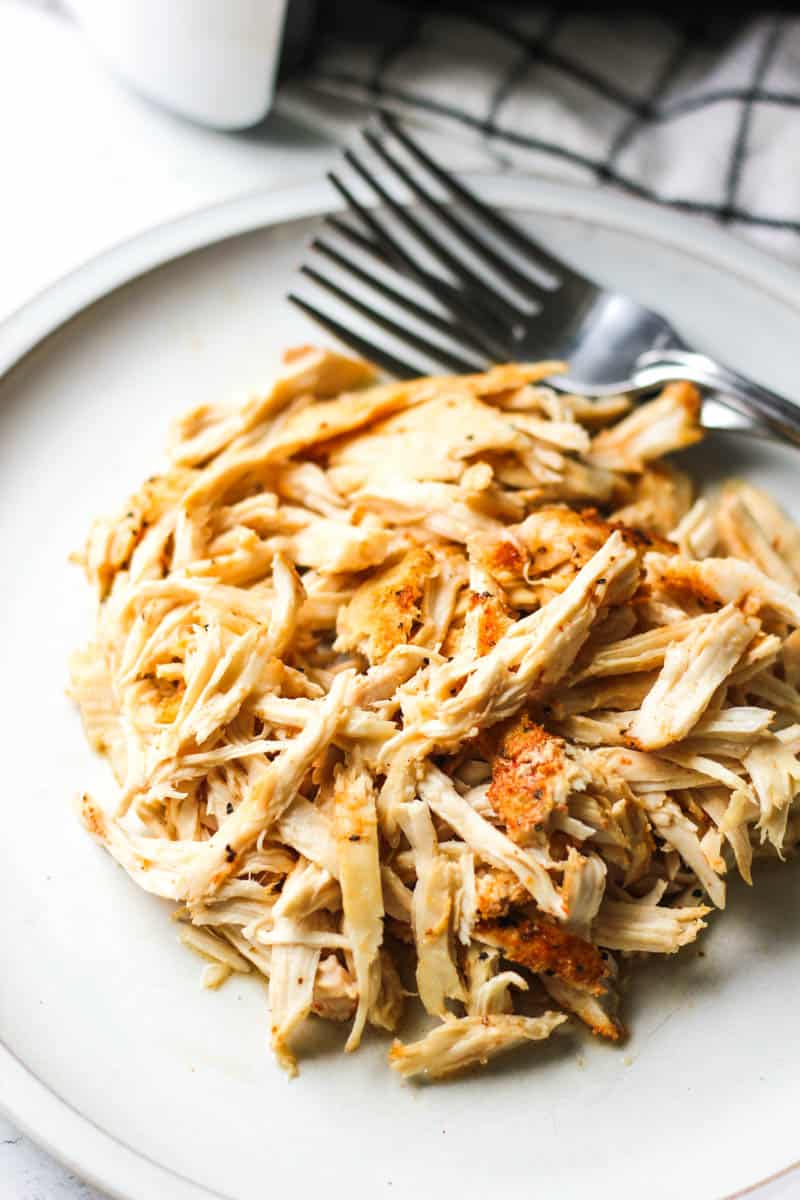 air fryer shredded chicken breast on the grey plate