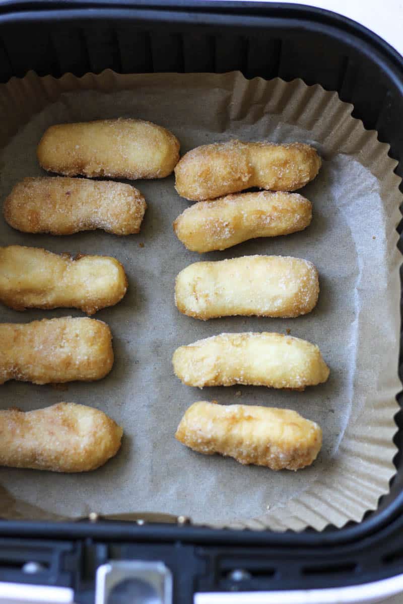 uncooked tenders in the air fryer basket