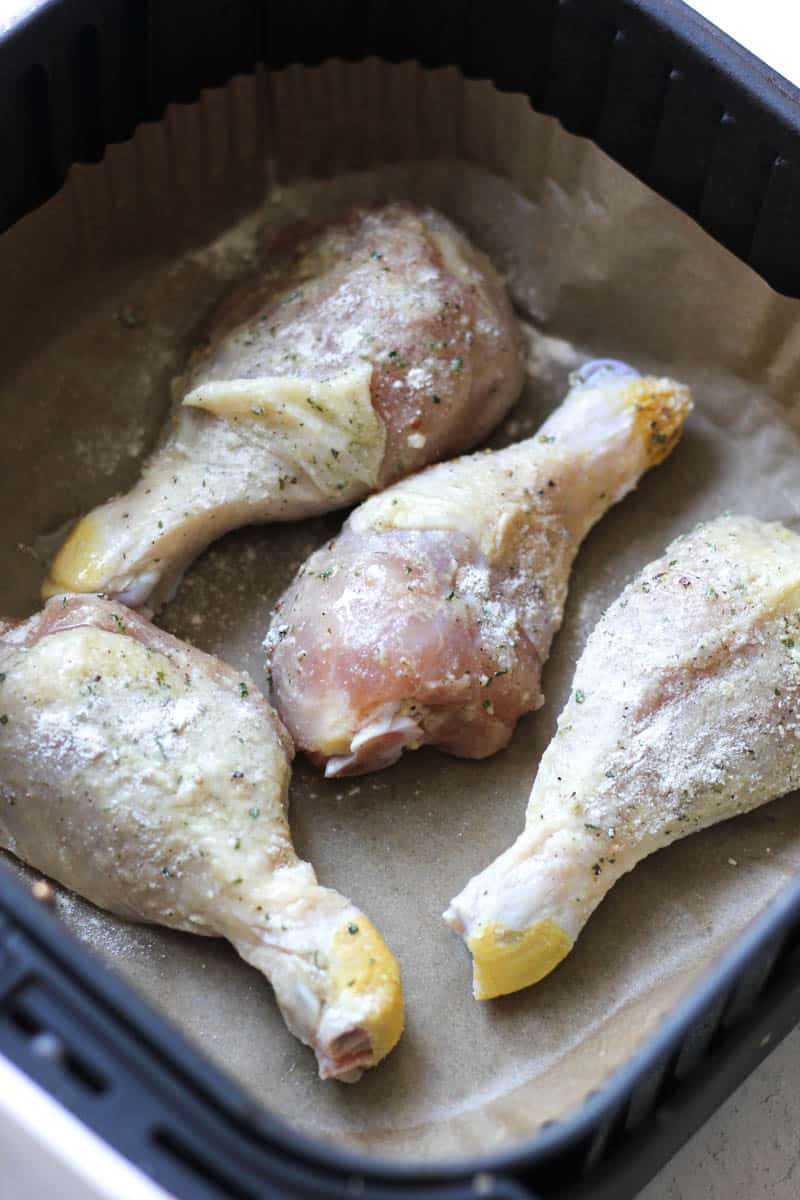 raw chicken drumsticks with ranch in the air fryer