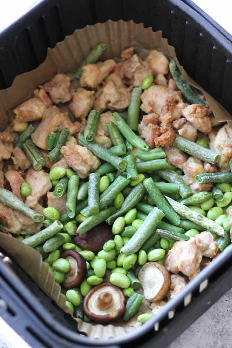 cooked chicken and vegetables in air fryer