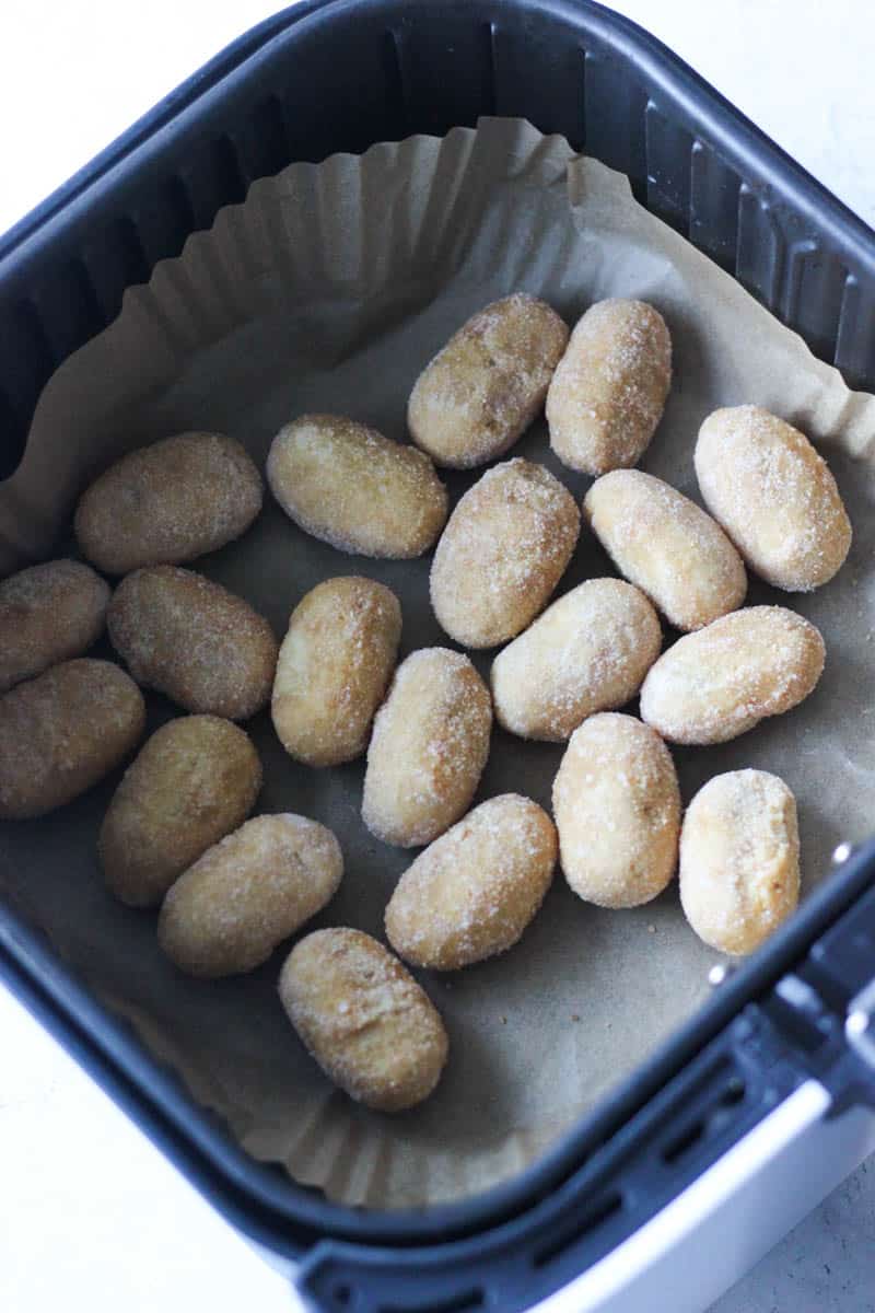 frozen uncooked mini corn dogs in air fryer basket