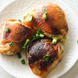 air fryer soy sauce chicken thighs on the white plate