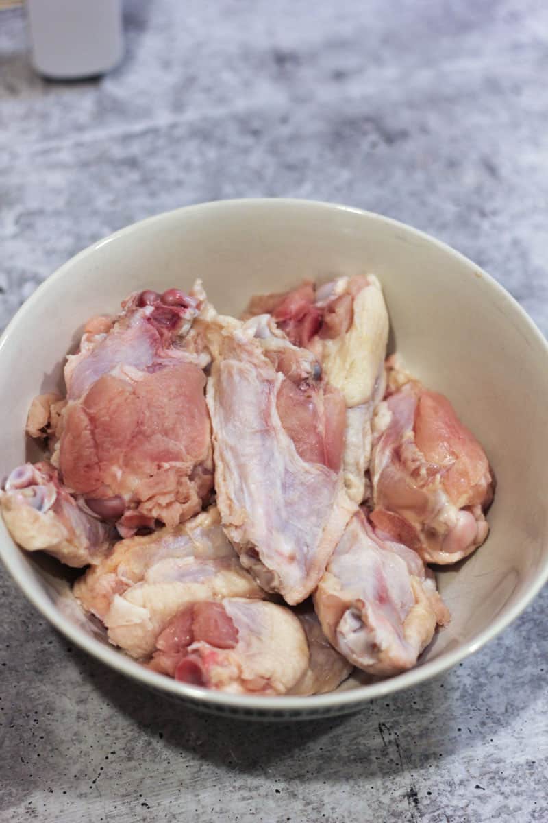 raw chicken wings in the bowl